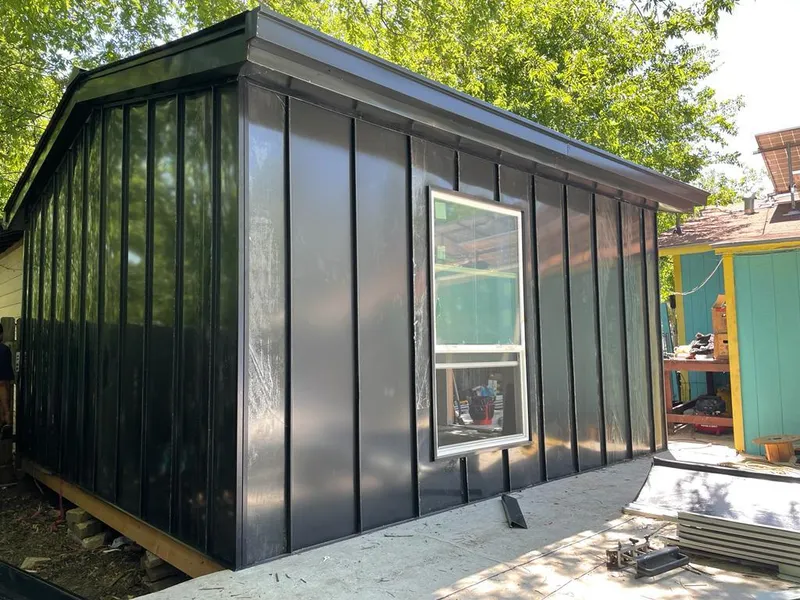 Black standing seam metal wall panels for Metal Roof Installation in Ozark