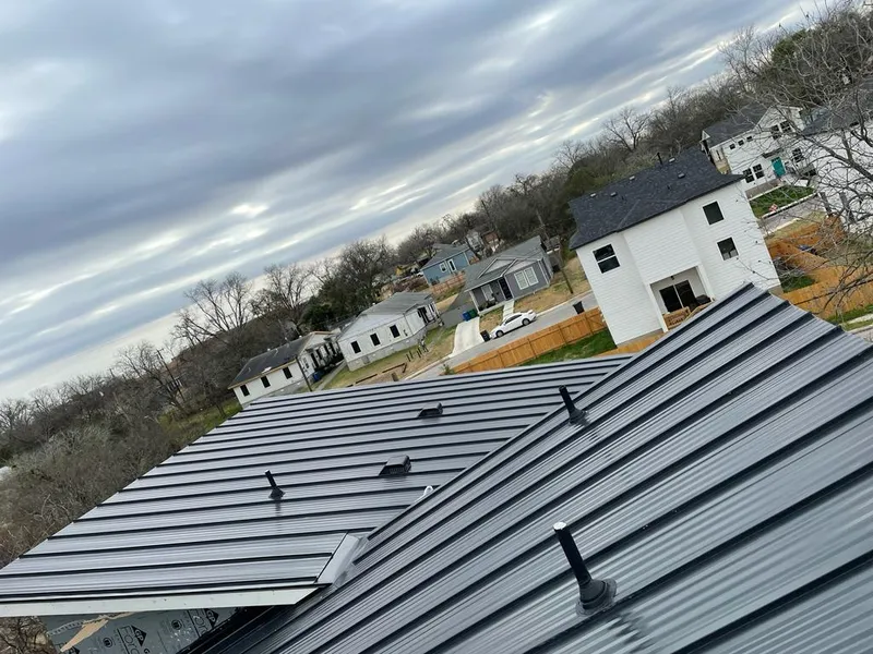 Standing seam metal roof panels with vents for Skylight Repair in Ozark